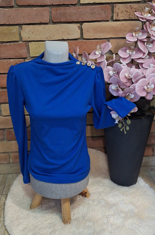 Bordázott gombos felső